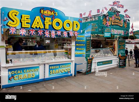 Seafood stalls on the harbourside at Scarborough, North Yorkshire Stock Photo - Alamy