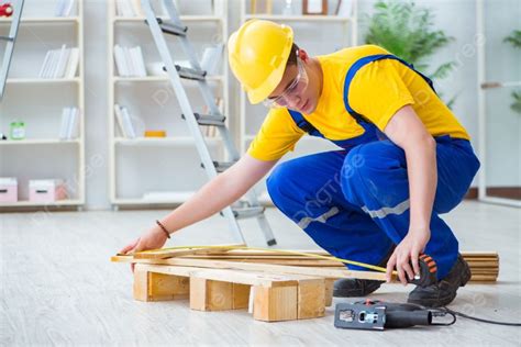 Young Man Assembling Wood Pallet Photo Background And Picture For Free ...