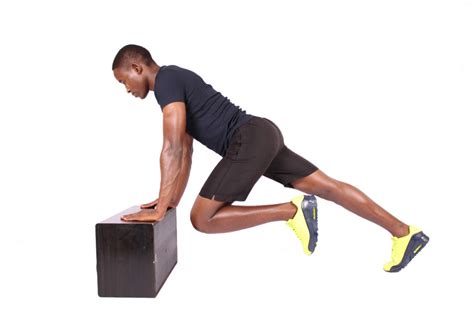 Fit Man Doing Elevated Mountain Climbers Ab Exercise