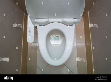 High Tech toilet with automatic bidet installed in public restroom ...