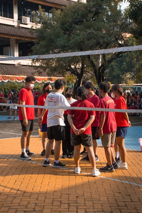 A group of people standing together photo – Free Indonesia Image on Unsplash