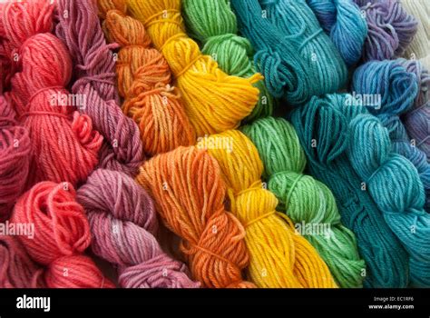 Assortment of colorful hand-dyed wool yarns Stock Photo - Alamy