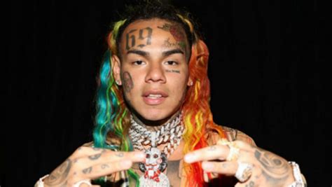 Tekashi 6ix9ine's Girlfriend Gets Huge Tattoo Of His Face | iHeart