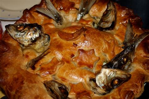 Stargazy Pie a traditional Cornish dish. The fish heads stick out of ...