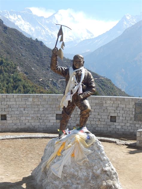 View of Everest in background. Statue of Tenzing Norgay near Namche ...