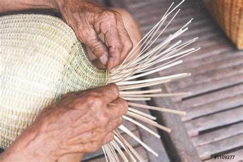 Weaving bamboo basket wooden old senior man hand working crafts - stock photo | Crushpixel