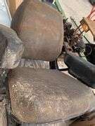 John Deere tractor seat - Schmid Auction