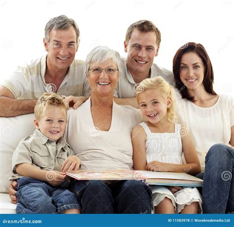 Smiling Family Observing Photograph Album Stock Photo - Image of kids, happy: 11583978