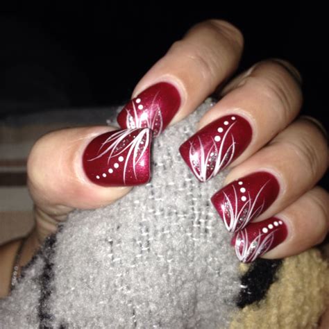 Red nails with white and silver designs | Red and silver nails, Silver nail designs, Red and ...