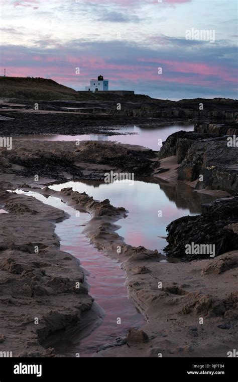 Bamburgh Castle & beach Stock Photo - Alamy