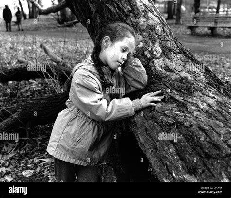Sad kids at the park Black and White Stock Photos & Images - Alamy