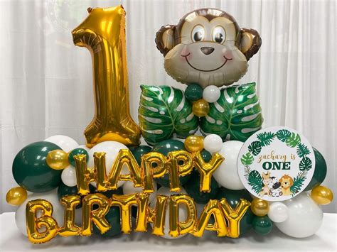 Fancy Balloon Bouquets - Jungle Themed First Birthday Balloons with Custom Logo & Monkey Head ...