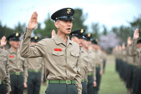 Fresh privates of the Republic of Korea Marine Corps take part in a ...