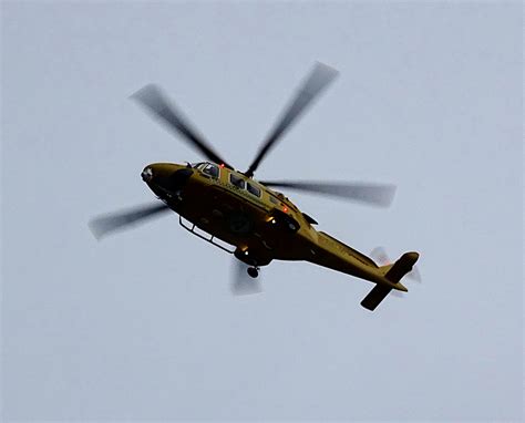 Yellow Helicopter In Flight Free Stock Photo - Public Domain Pictures