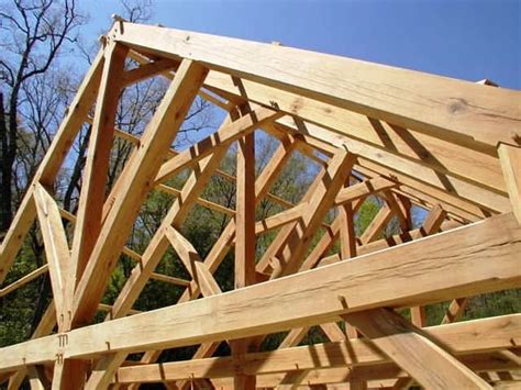 Timber frame trusses create an open and dramatic effect