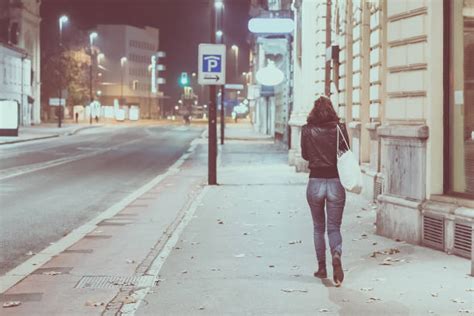 Woman Walking Alone At Night Stock Photos, Pictures & Royalty-Free Images - iStock