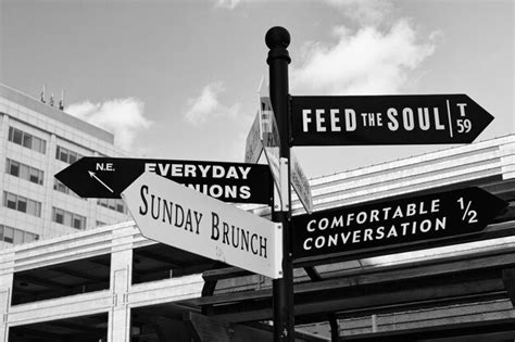 Premium Photo | Closeup shot of street signs in black and white