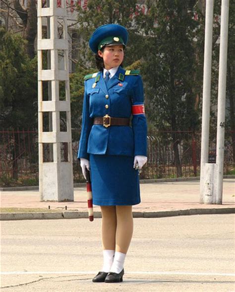 Traffic Women of Pyongyang : aj. The blue uniform