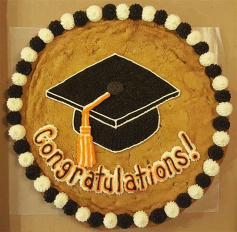 Graduation cap cookie cake. | Cookie cake designs, Graduation cookies, Graduation cake pops