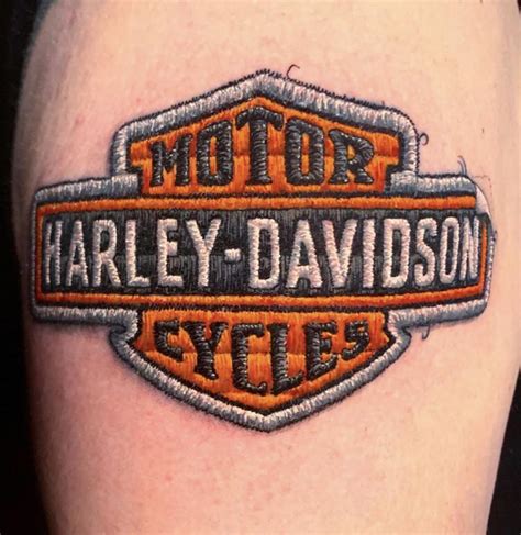 Harley Davidson Logo With Flames Tattoo