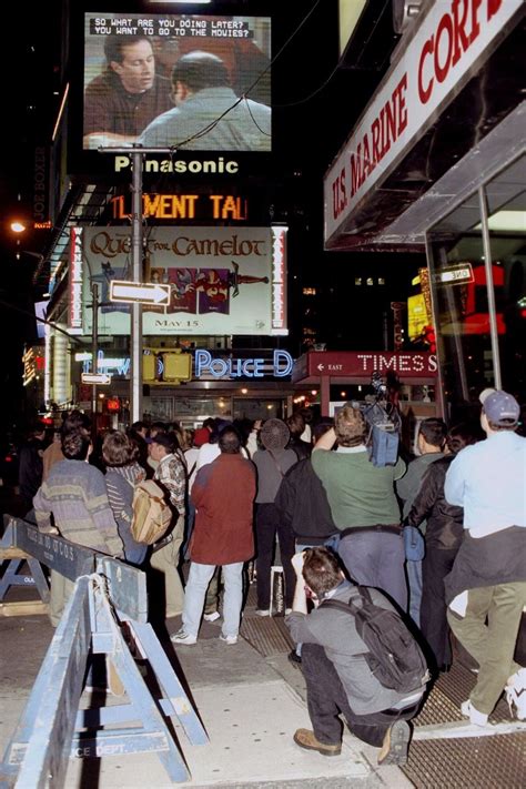 New Yorkers stopping to watch the finale of Seinfeld at Times Square, 1998 : r/nyc