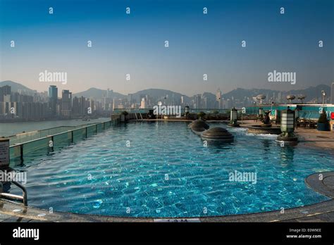 Pool on the roof of the Harbour Grand Hotel, skyline at the back ...