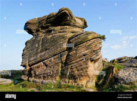 Ancient gritstone rock formation known as Mother Cap on Surprise View, Derbyshire, in the ...