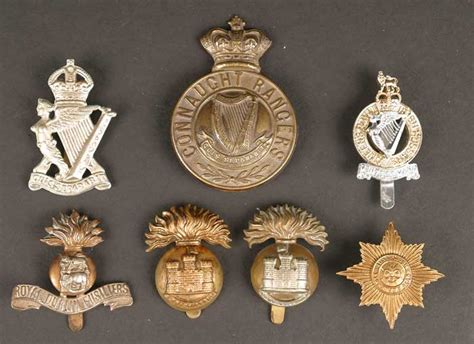 A collection of various regimental badges, Irish regiments British Army ...