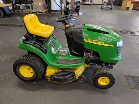 JOHN DEERE L100 17 H.P. GASOLINE POWERED LAWN MOWER, 42" DECK