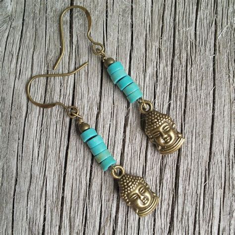 Buddha earrings in my shop right now. #yoga #buddha #earri… | Flickr