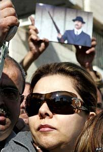 Saddam Husseins daughter joins demonstration in Jordan yesterday ...