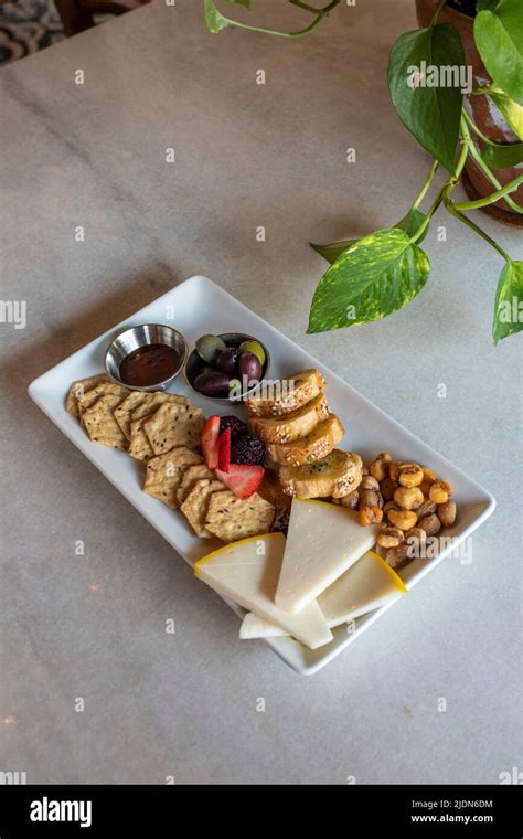 Cheese board from a wine bar Stock Photo - Alamy