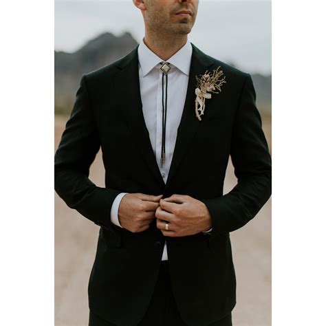 Bolo tie, boutonniere. Southwest groom style. Photo by: www.instagram.com/daneroyphoto | Mens ...