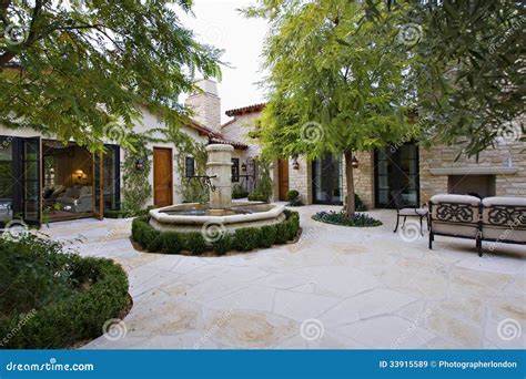 Courtyard with Fountain stock image. Image of structure - 33915589