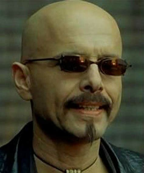 Attore (Joe Pantoliano) alias Cypher.