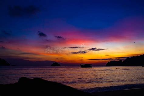 Beautiful Sunset Beach with Red Sky Stock Photo - Image of clouds ...