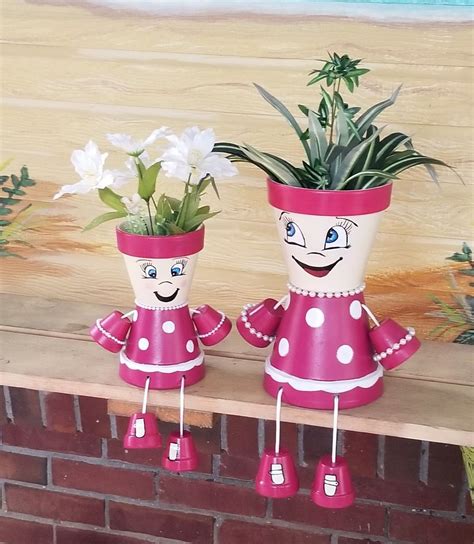 Clay pot polka dot girls. Flower Pot Art, Clay Flower Pots, Flower Pot Crafts, Flower Pot People ...