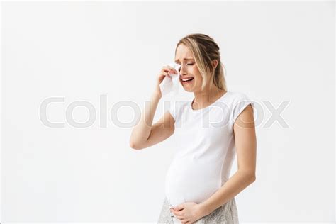 Image of a sad young pregnant woman ... | Stock image | Colourbox