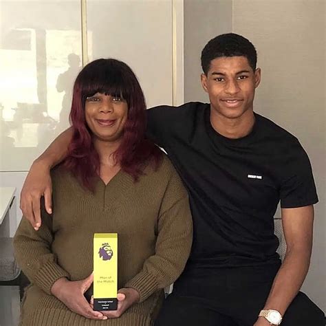 Who are the parents of Marcus Rashford?