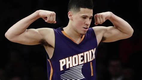 Suns' Devin Booker scores 70 points vs Boston Celtics - Sports Illustrated