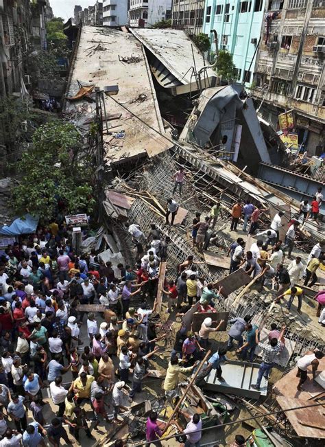 21 killed, many trapped in overpass collapse in India