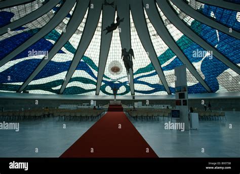 BRAZIL Goias Brasilia Cathedral Metropolitana interior Stained glass ceiling and suspended ...