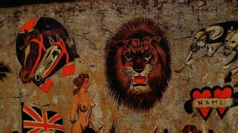 the banner shows tattoo designs in colour: a lion's head, two ...