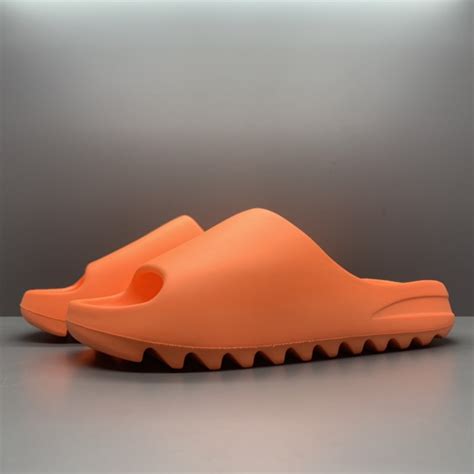 Yeezy Slides 'Enflame Orange' - SneakerCool.com