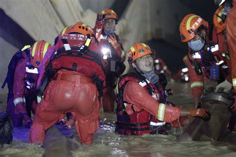 10 more bodies found in flooded tunnel - Chinadaily.com.cn