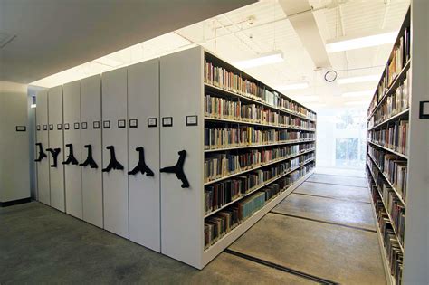 A high density shelving, and rolling file shelving help to save floor ...