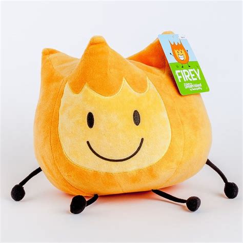 an orange stuffed animal with a smile on it's face