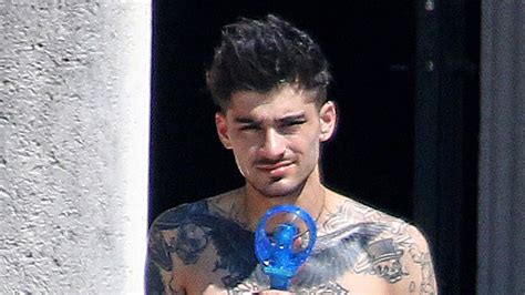 Zayn Malik Adds Two Neck Tattoos to Ink Collection | Allure