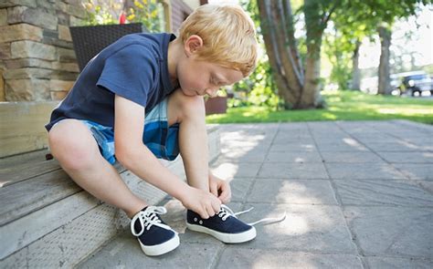 Parents who avoid teaching children how to tie shoelaces are 'hindering their development'