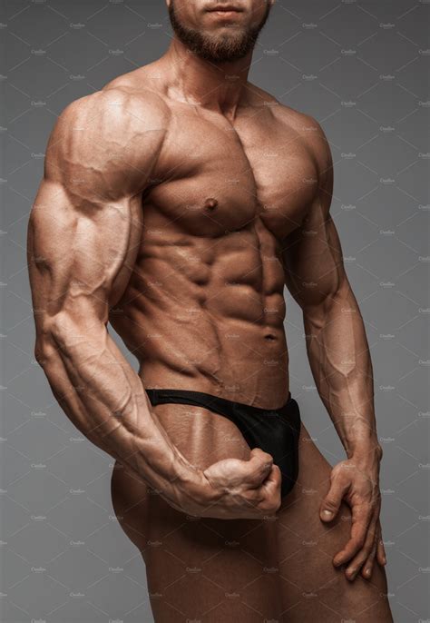 Bodybuilder man with perfect abs containing muscle, bodybuilder, and ...